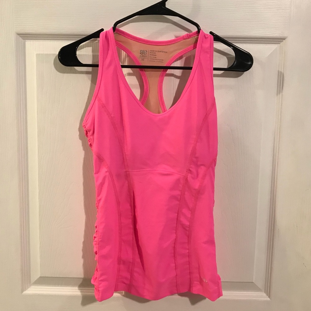 Two Albion Fit workout tanks